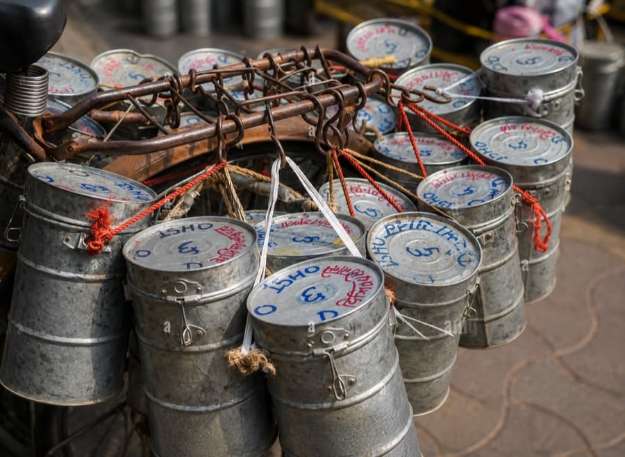 A Mumbai dabbawala at work