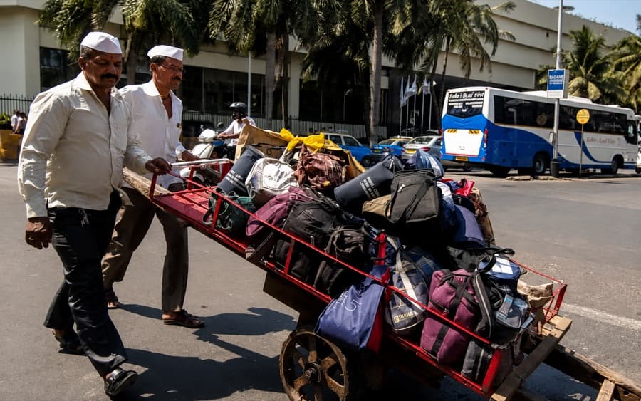 A Mumbai dabbawala at work