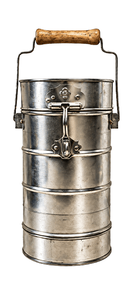 A traditional stainless steel tiffin carrier with a wooden handle